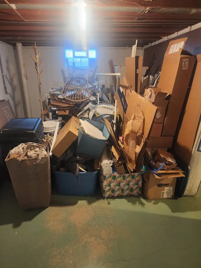 Roll-off dumpster container at job site for 4 Yard Dumpster Rental in Millbury